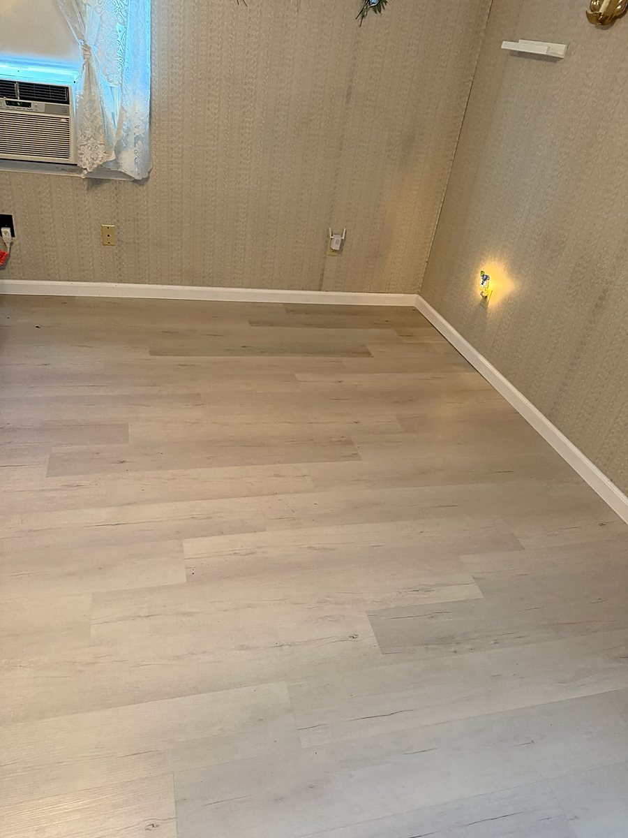 Hamilton, NJ: Bedroom in light grey-wash plank, an RJ Laminates installation